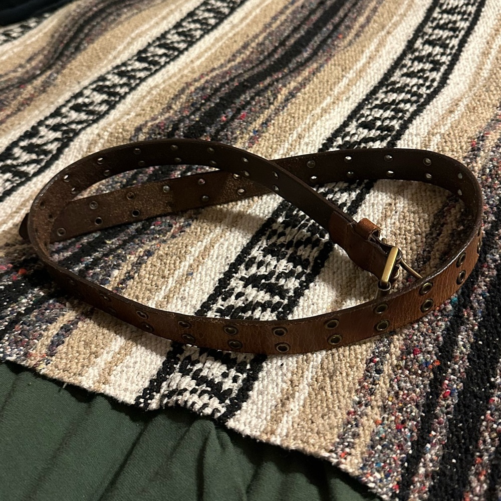 double hole punched belt with gold metal